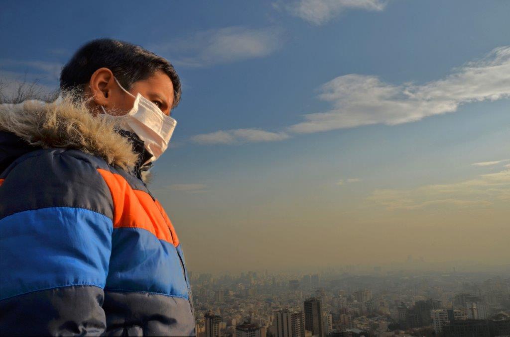 Even clearer - a polluted inversion layer, with one of the kids who have to live in Tehran's air. One-third of days in Tehran are 'unhealthy' for adults - more will be bad for the growing lungs of kids. Credit goes to Mrs. Nasim Khadivi Zand (the photographer) and Air Quality Control Co. of Tehran